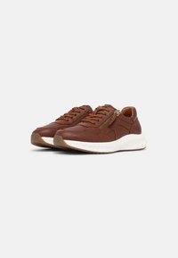 Brown leather sneakers with a textured finish, featuring a white cushioned sole, laces, and a decorative side zipper detail.