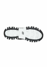 Suela de zapato deportivo en blanco y negro con un diseño de goma texturizada, que presenta un logotipo distintivo y un diseño ergonómico para mayor agarre y comodidad.