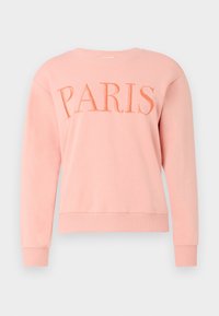 Sudadera rosa con cuello redondo, que presenta "PARÍS" en letras naranjas bordadas. Puños y dobladillo acanalados, textura de tela suave.