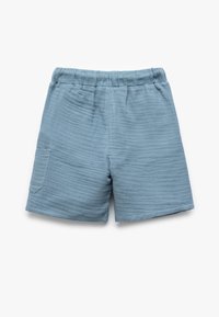 Hellblaue Baumwollshorts mit strukturiertem Stoff, elastischem Bund und einer Seitentasche. Einfaches Design mit lässiger Passform.