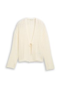 Roomkleurig vest met open gebreide structuur, lange mouwen en een kleine sluiting met een strik aan de voorkant, plat gelegd op een witte achtergrond.