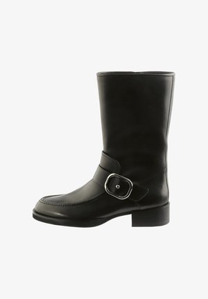 Black mid-calf leather boot with a rounded toe, low heel, and a wide strap featuring a large silver buckle on the side.