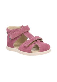 Růžové semišové sandály s suchým zipem, otevřená špička a bílá gumová podrážka. Obsahuje akcenty šití a výřezy na bočních panelech.