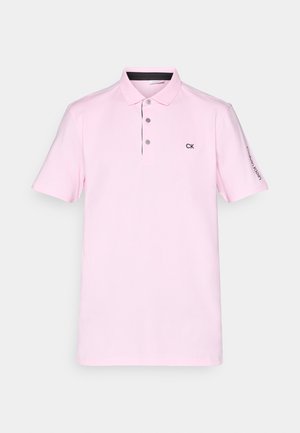 Lyserød polo skjorte i blødt bomuld med en to-knaps placket, sorte detaljer og CK-logo på venstre bryst og ærme. Korte ærmer.