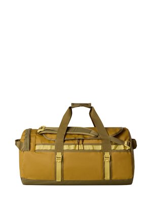 Dufflebag aus olivgrünem und senfgelbem Nylon. Verfügt über zwei Griffe, verstellbare Gurte, Reißverschlussfächer und verstärkten Boden.