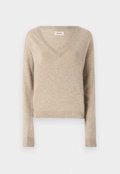 Light beige knitted sweater with a V-neck, long sleeves, and ribbed hem. Soft texture, cropped design, and subtle color variations.