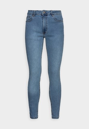 Jean slim bleu pour femmes avec cinq poches, fermeture à boutons et passants de ceinture, présenté sur un fond clair uni.