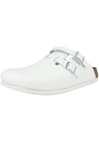 White clogs with a smooth finish, two adjustable silver buckles, and a cork-textured insole. Flat rubber sole with slight ridges.