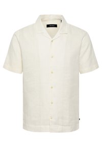 Camisa de lino de manga corta en color crema, con cuello tipo solapa, cierre frontal de botones y un corte relajado con dobladillo recto.