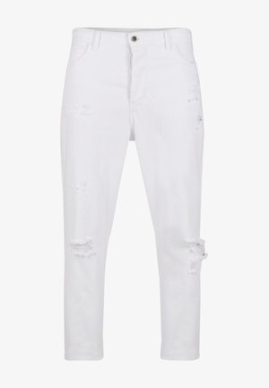 Balti džinsai su tiesiu kirpimu, turintys sugadintų dėmių ant abiejų kojų ir klasikinį penkių kišenių dizainą.