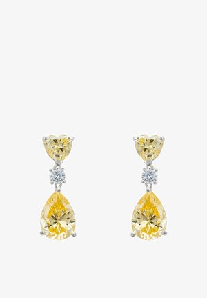 Sárga drágakő fülbevalók, szív alakú tetejével, kerek középső részével és körte alakú aljával, ezüst színű fémkeretben, fényes felülettel.