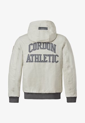 Light beige jacket with a hood, featuring gray embroidered text "CORDON ATHLETIC" on the back, and ribbed gray cuffs and waistband.