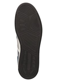 Semelle de chaussure en caoutchouc noir avec des rainures et des motifs texturés, présentant un talon arrondi et une légère arche pour le soutien.