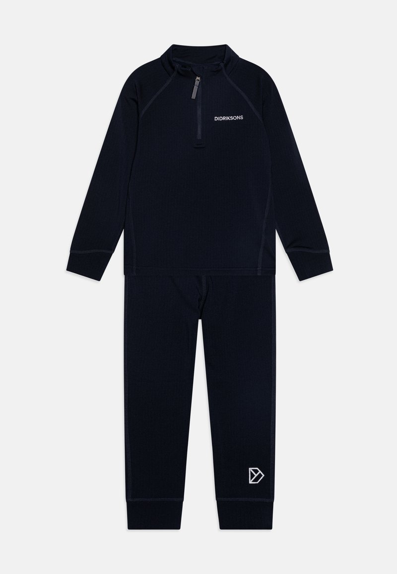 Navy blue two-piece thermal set made of soft material, featuring a half-zip top and fitted pants with contrasting stitching and logo detail.