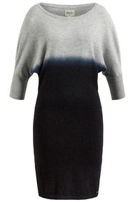 Khujo Strickkleid mit einem lockeren, grauen Oberteil, das in einen engen, schwarzen Unterteil übergeht. Hergestellt aus weichem Strickstoff.