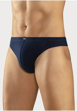 Male torso wearing navy blue briefs with a small front label, against a plain light background.