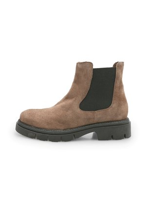 Brown suede Chelsea boots with a black elastic inset, curved design, and a thick, ridged rubber sole, featuring a rounded toe.