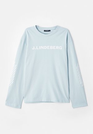 Camiseta de manga larga en azul claro de tejido suave, con el logotipo "J. Lindeberg" en blanco en el frontal y un acento estampado en las mangas.