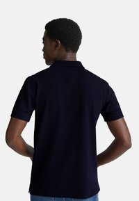 United Colors of Benetton SHORT SLEEVE WITH LOGO PATCH ON LEFT BREAST - Polotričko - blue