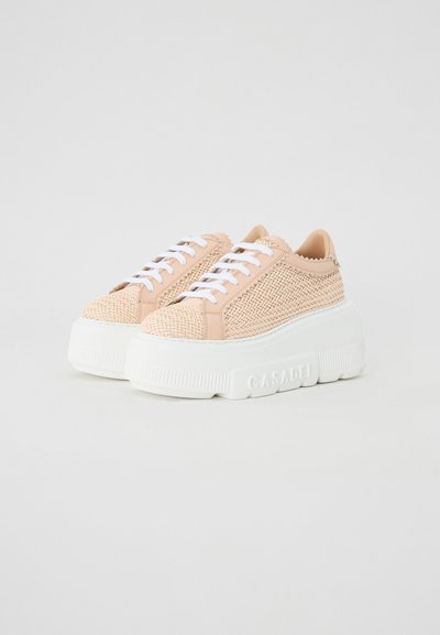 Light peach woven sneakers with white laces, rubber platform sole, textured upper, and CASADEI logo on the side.