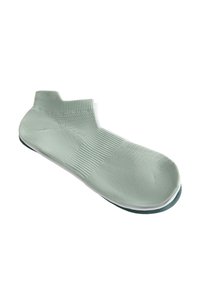 Light green sock with a textured knit design, low-cut ankle, and a white sole. Features a seamless appearance and elastic top for snug fit.
