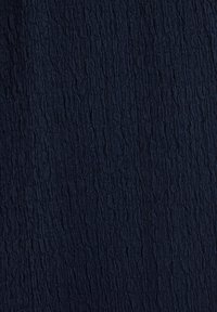 Navy blue textured fabric with a crinkled surface pattern, offering a tactile, three-dimensional appearance. Smooth and soft texture.
