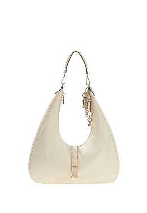 Borsa a tracolla in pelle color crema con una singola cinghia per la spalla, chiusura in tonalità oro, portachiavi decorativo e piccolo logo al centro frontale.