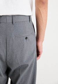 Weekday UNO LOOSE SUIT TROUSERS - Suit trousers - dark grey