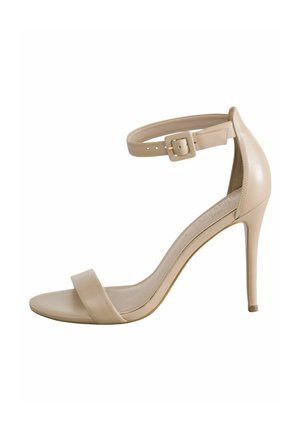 Beige sandaalit, joissa on korot ja nilkkaremmi, sileä nahkapinta, leveä varvasremmi ja stiletto-korko.