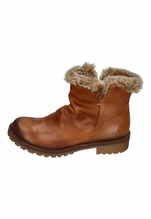 Brown leather ankle boot featuring a soft faux fur trim, rounded toe, and textured rubber sole with a slight heel.
