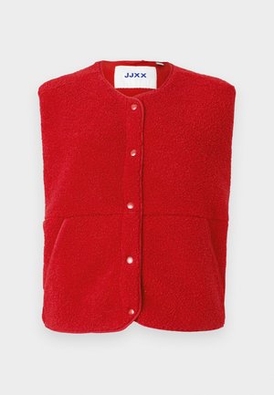 Rode fleece vest met een ronde halslijn, vooraan drukknopen en twee zijzakken met een textuurovervlak. Label zegt "JJXX."