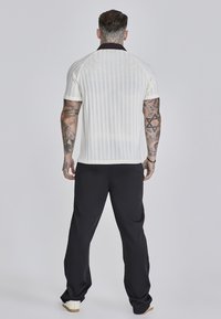 SIKSILK Nadrágok - black