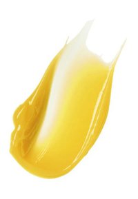 Gelbe Creme mit einer glatten, glänzenden Textur, die sich in einer geschwungenen, wirbelnden Form verteilt. Licht spiegelt sich von der Oberfläche wider und hebt ihren Reichtum hervor.