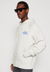 Edwin EMANATION HOODIE UNISEX - Sweatshirt - mist