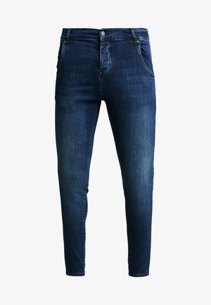 Tmavě modré džíny slim fit s předním zapínáním na knoflíky a zip, dvěma předními kapsami a jemně vybledlými detaily na stehnech.