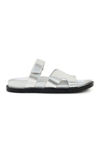 Silver metallic open-toe sandal with adjustable strap and black textured sole, shown in side profile on white background.