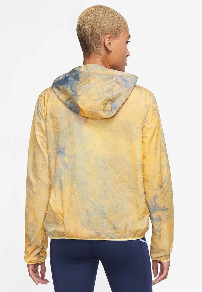 gold nike jacket
