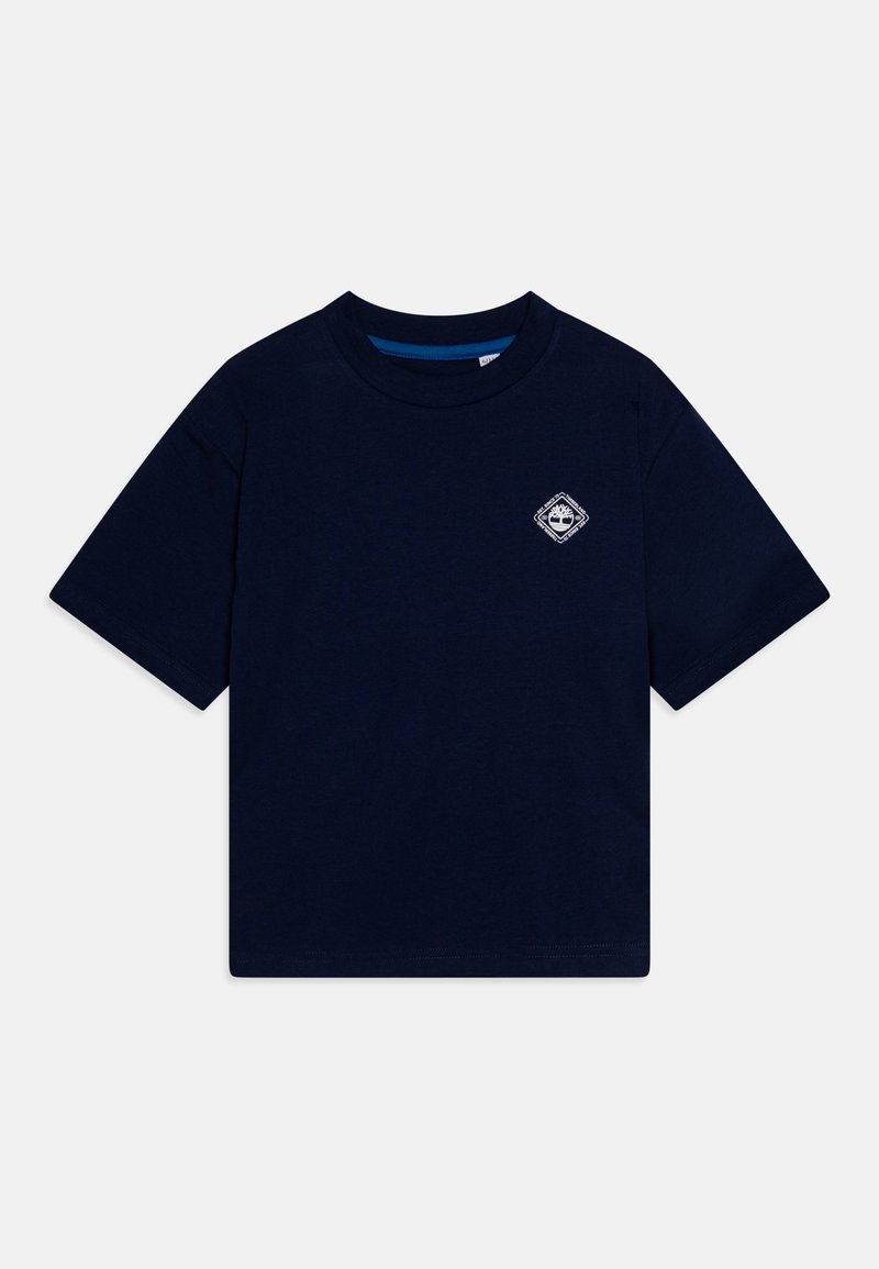 Camiseta de manga corta azul marino de algodón, con un pequeño emblema gráfico blanco en el lado izquierdo del pecho y un clásico escote de cuello redondo.