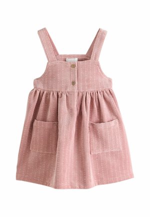 Rosa Cordkleid für Kleinkinder mit breiten Schulterträgern, zwei vorderen Taschen und zwei kleinen Holzknöpfen auf der Brust.