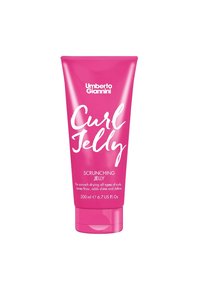 Roze, knijpbare tube van Umberto Giannini Curl Jelly, 200ml. Dikke witte tekst met de productnaam en gebruiksaanwijzing. Gladde textuur.