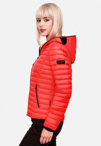 Red puffer jacket with horizontal quilted pattern, zippered pockets, and a hood. Features black accents and branding on the upper sleeve.