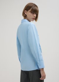 Calliope CON NODO  - Hemdbluse - azzurro