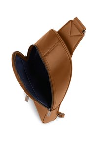 Tan leather sling bag with a heart-shaped design, featuring a smooth exterior, blue interior lining, and a zip closure. Metal hardware accent.