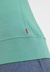 Vaude Felpa con cappuccio - green