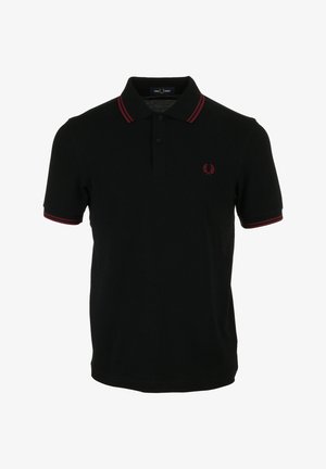 Zwarte polo-shirt met rode strepen op de kraag en mouwen, gemaakt van katoen, met een klein geborduurd logo op de borst.