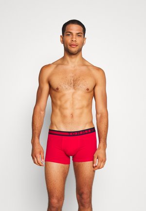 Red boxer briefs with a fitted design. Soft cotton material and a contrasting black waistband featuring logo details.