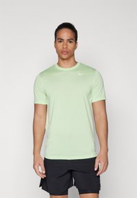 Nike Performance - TEE RESET - Sport T-shirt - vapor green/white Miniatuurafbeelding 1