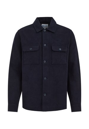 Donker marineblauwe shirtjas gemaakt van gestructureerde stof. Beschikt over een klassieke kraag, twee borstzakken en knoopsluitingen aan de voorkant.