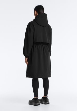 OYSHO FELLEX® AEROGEL 10K WATERPROOF LONG PADDED - Impermeabile - black