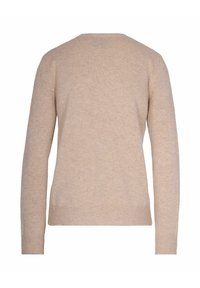 Maglione lavorato a maglia di un beige chiaro con maniche lunghe, orlo e polsini a coste, texture morbida, semplice scollo rotondo e design essenziale.